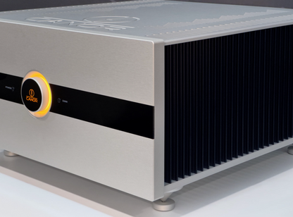 Canor Virtus S1S Solid State Dual-Mono Power Amplifier in Silver, on an angle, side view