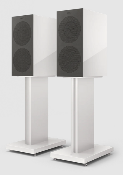 KEF R3 Meta Bookshelf Speakers in Gloss White, with grille, on stands.