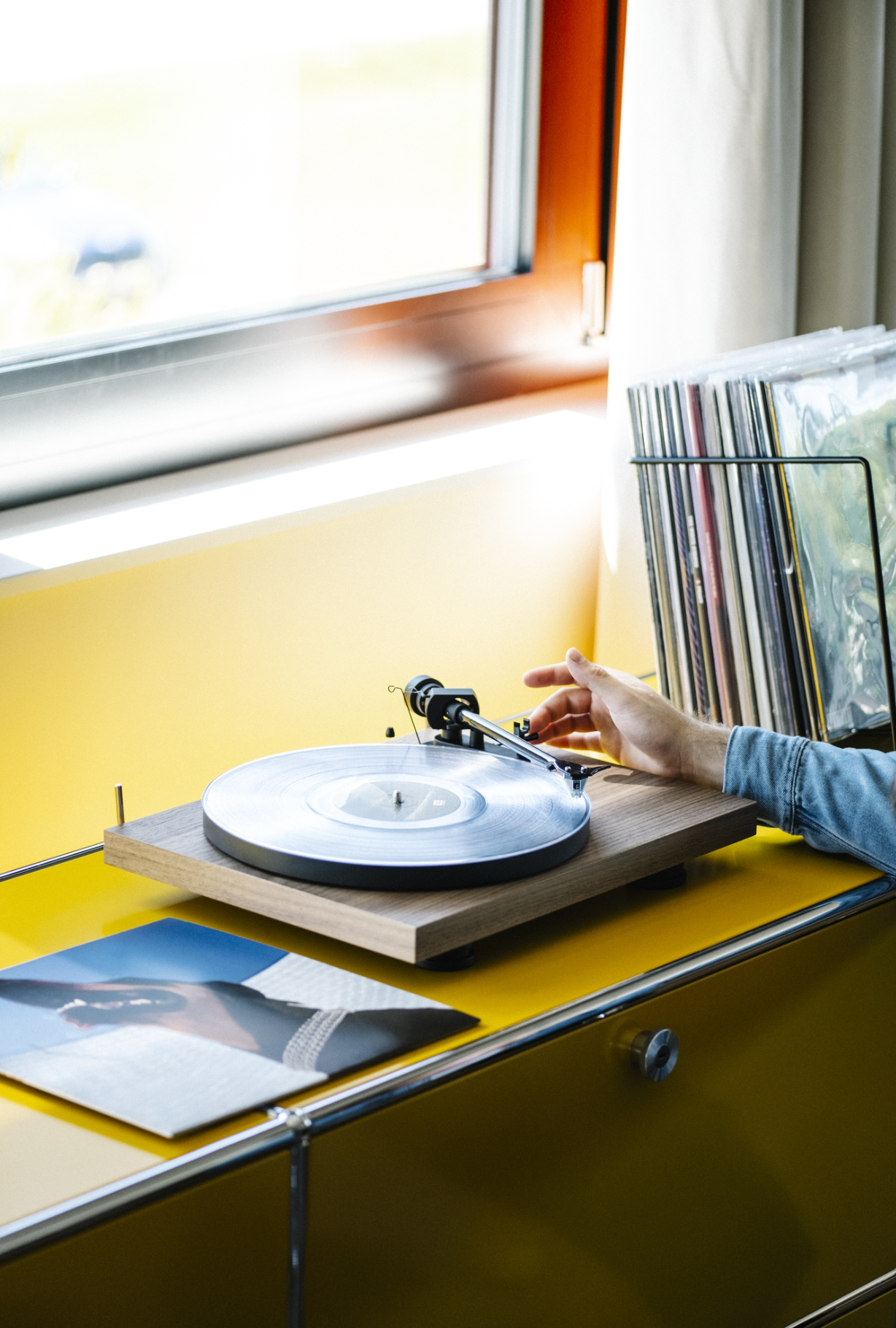 ProJect Debut EVO 2 Turntable with Pick It MM Cartridge in Walnut, lifestyle image