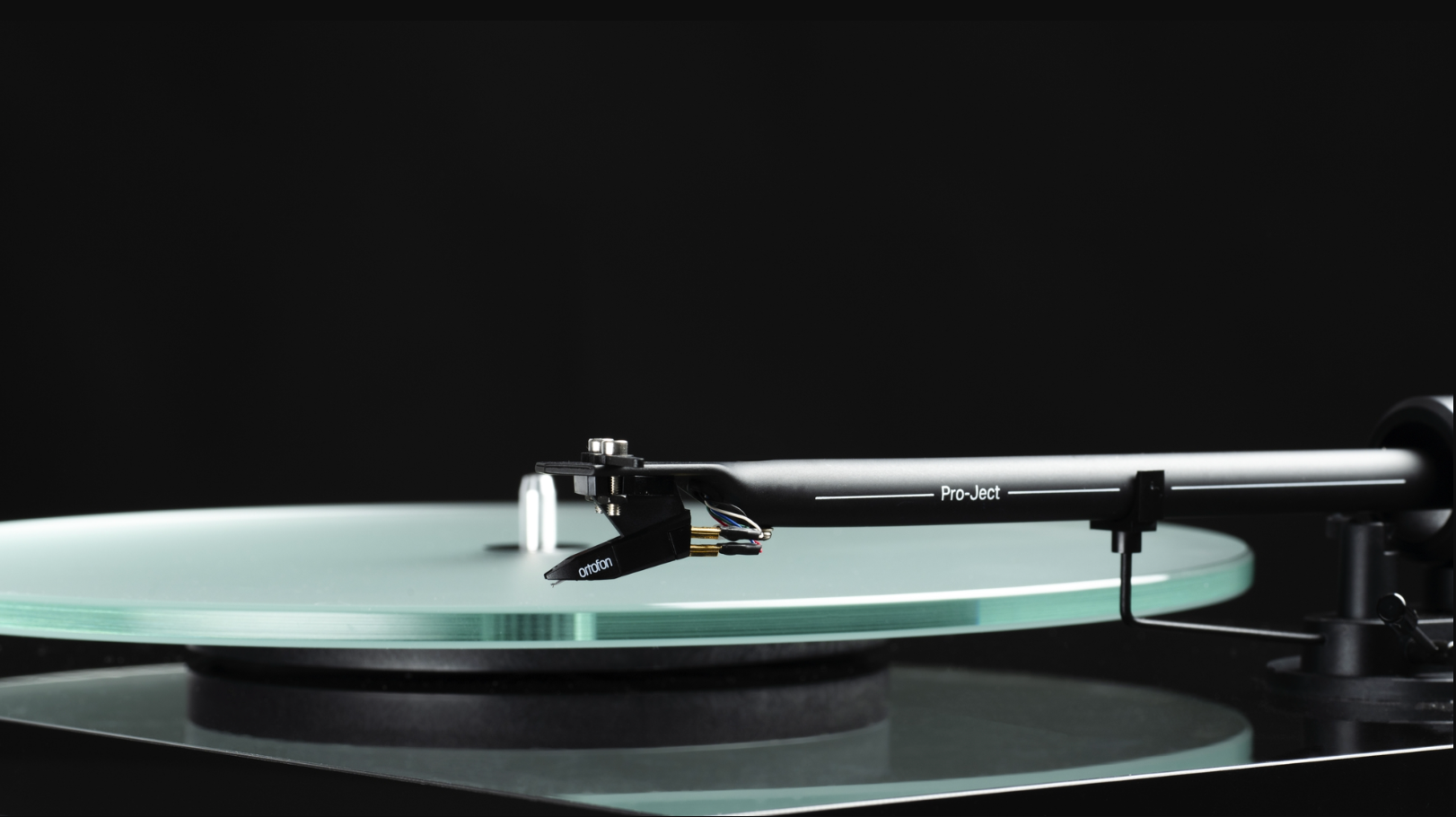 ProJect T1 EVO Phono Turntable with Ortofon OM 10 Cartridge, tonearm and cartridge closeup