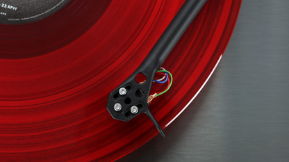 Rega Planar 3 RS Special Edition with ND5 in Brushed Aluminium Black without dustcover.  Closeup of cartridge on disc