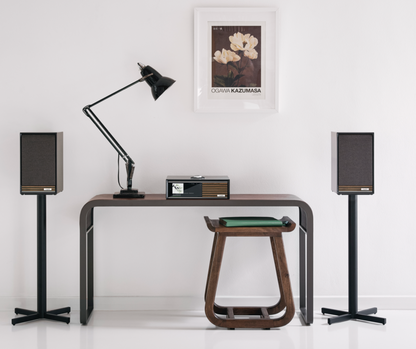 Ruark Sabre-R Bookshelf Speakers in Satin Charcoal Lacquer with Walnut Slat Trim, with Grilles.  Shown mounted with R610 Music Console. Not sold with stands